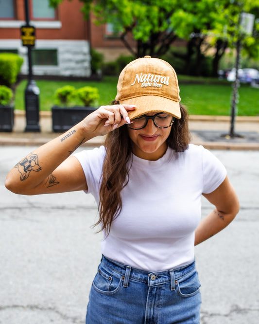 Model wearing Natural Light Corduroy Hat