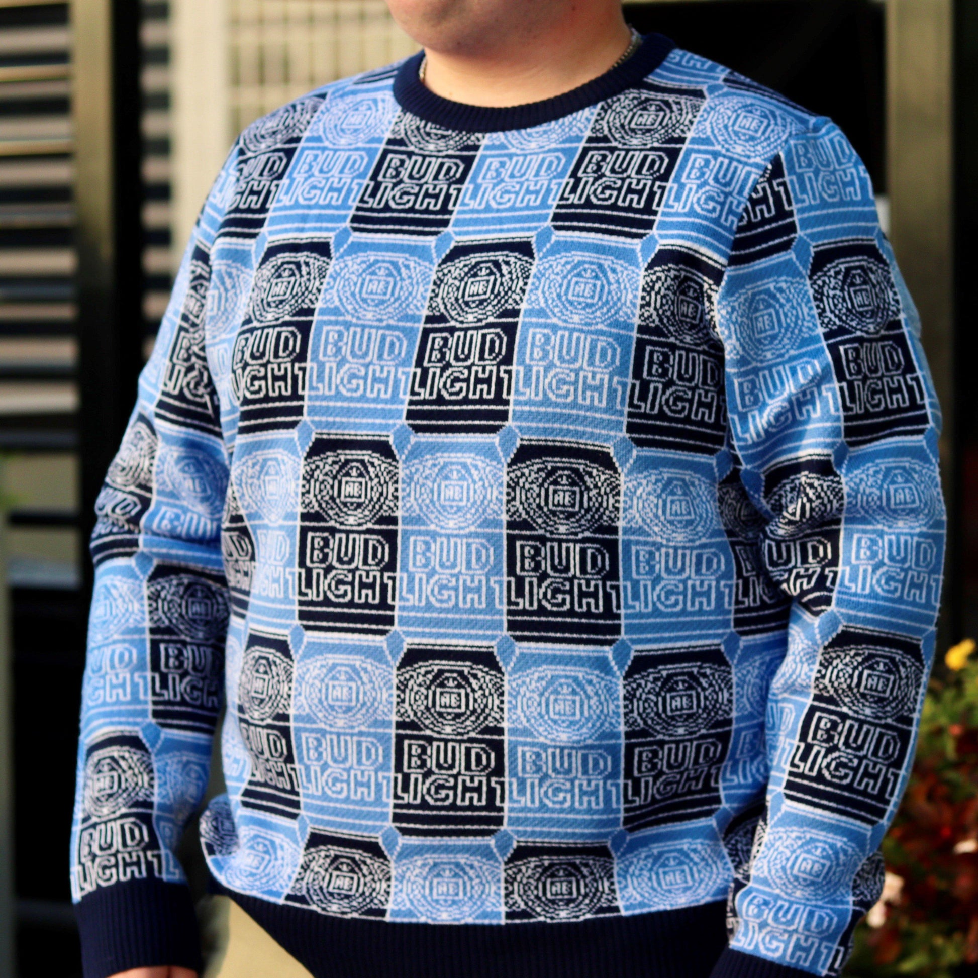 man wearing bud light can repeat sweater