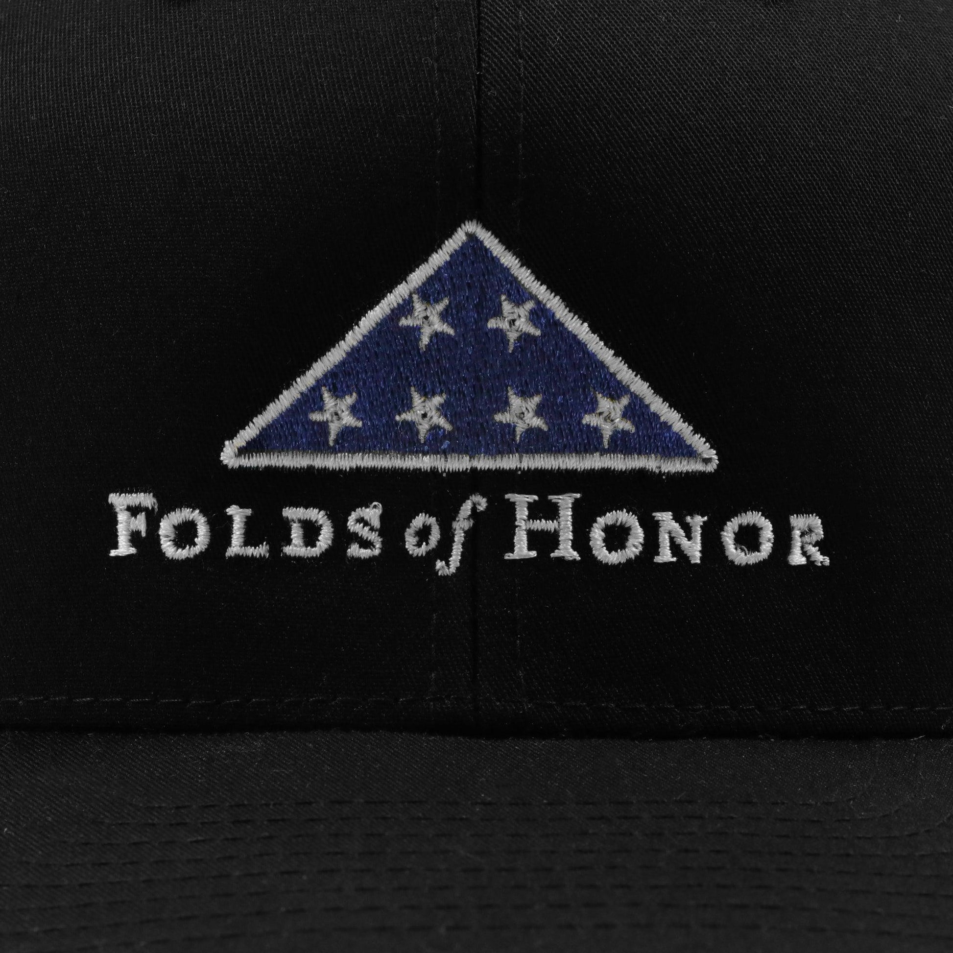 CLOSE UP OF FOLDS OF HONOR EMBROIDERY ON FRONT OF HAT