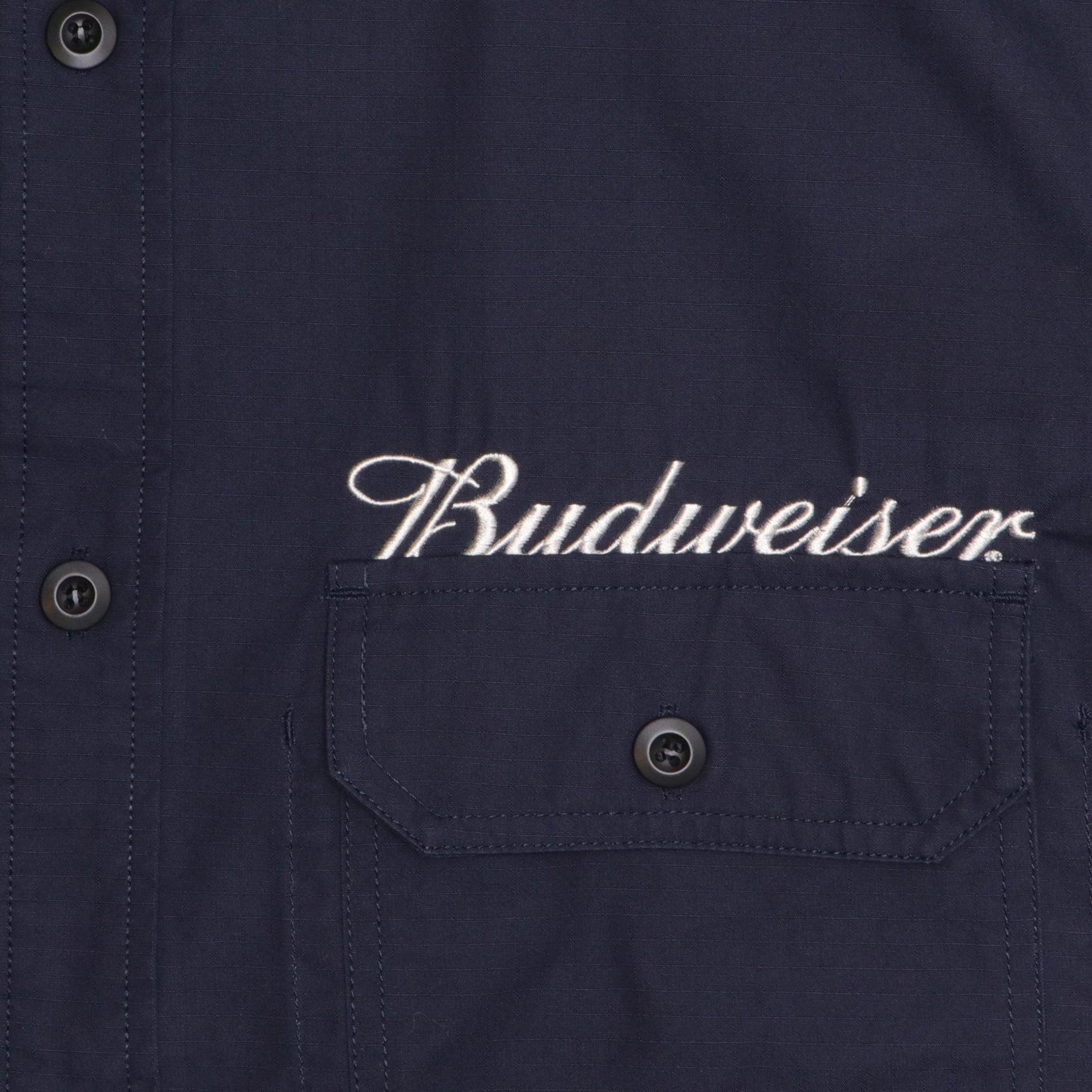 detail of budweiser above pocket