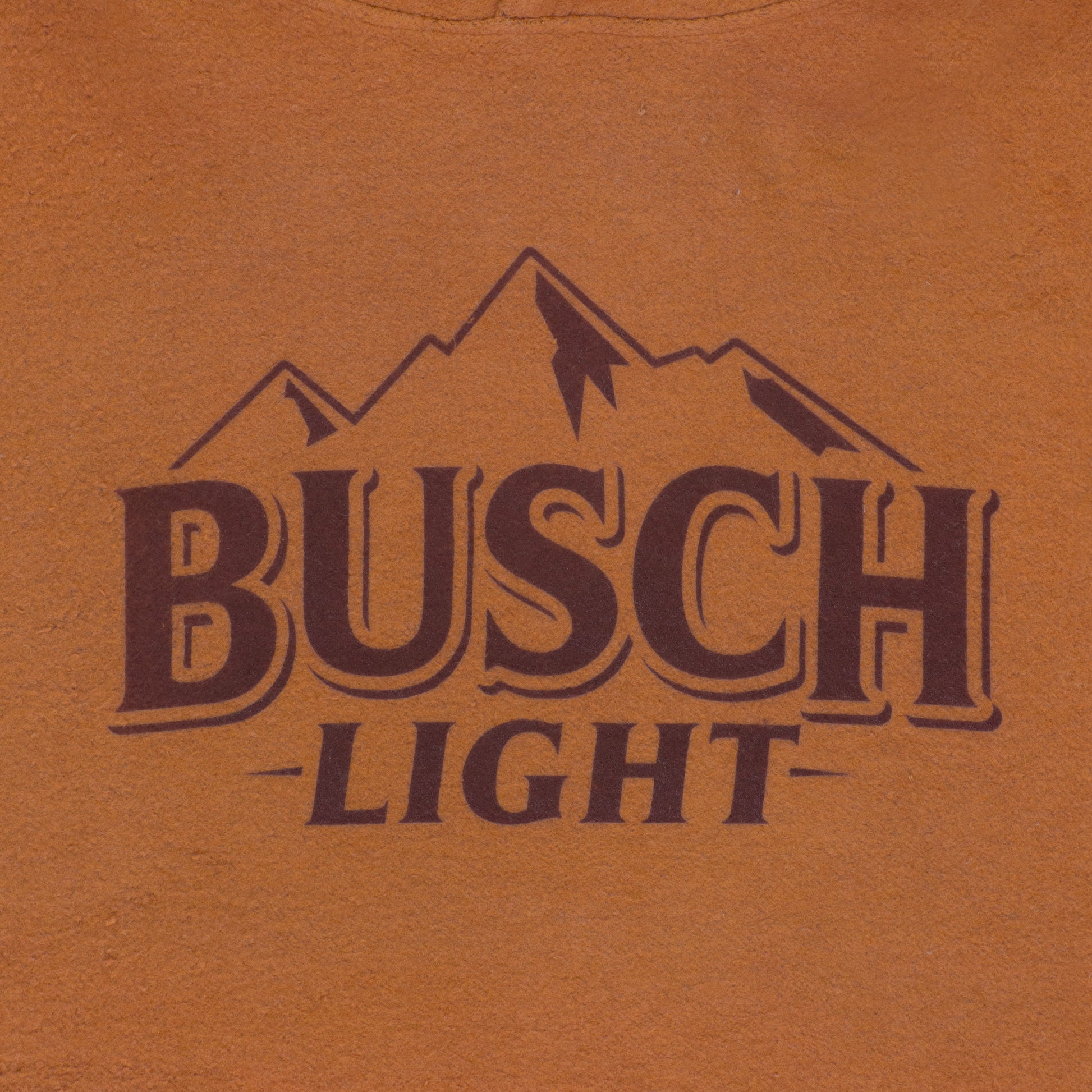 Close Up of Busch Light Mountain Logo on front center chest