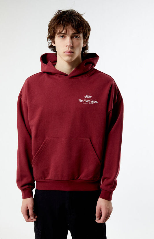 Front view of model wearing PacSun x Budweiser "King of Beers" Red Hoodie