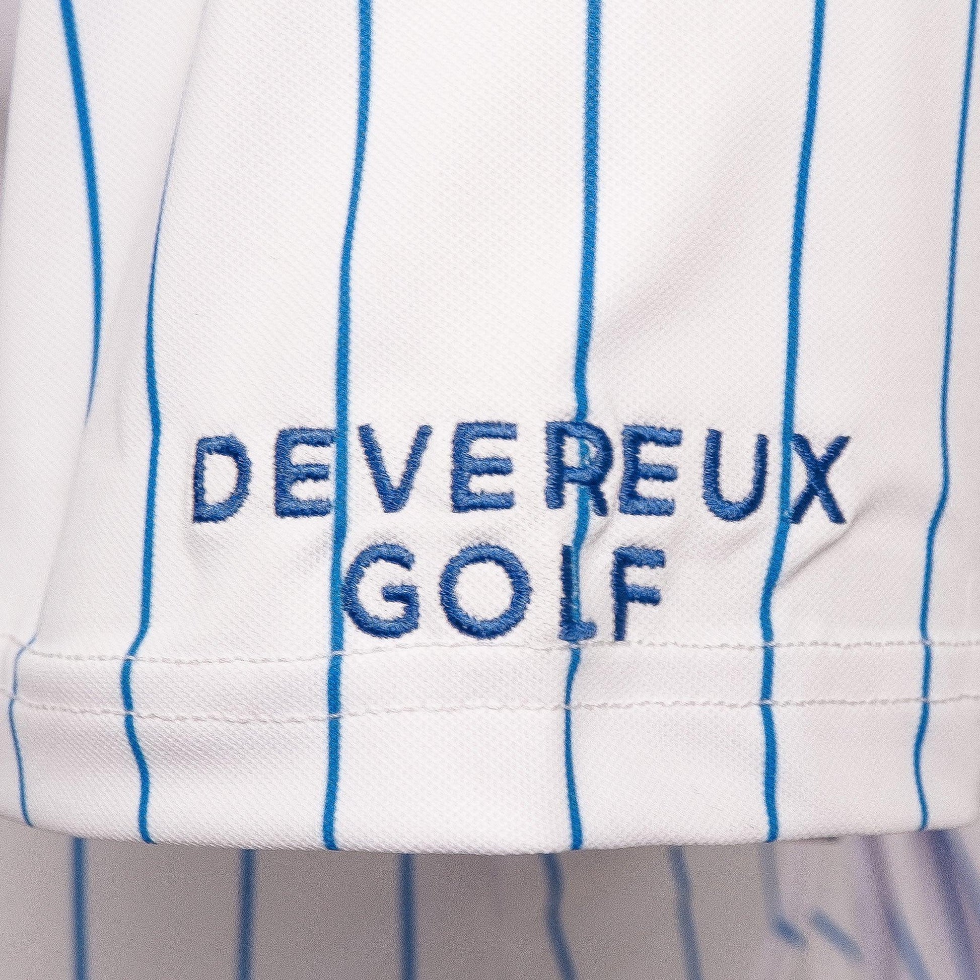 Close up of embroidered blue Devereaux Golf on sleeve of polo