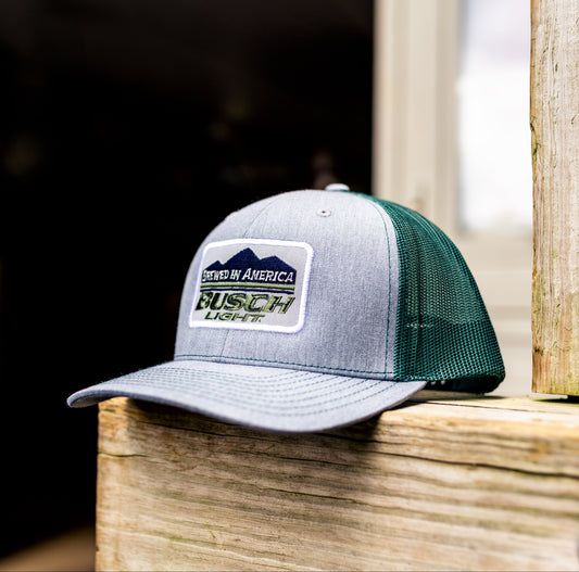 Busch Light Brewed in America Hat on a wood post