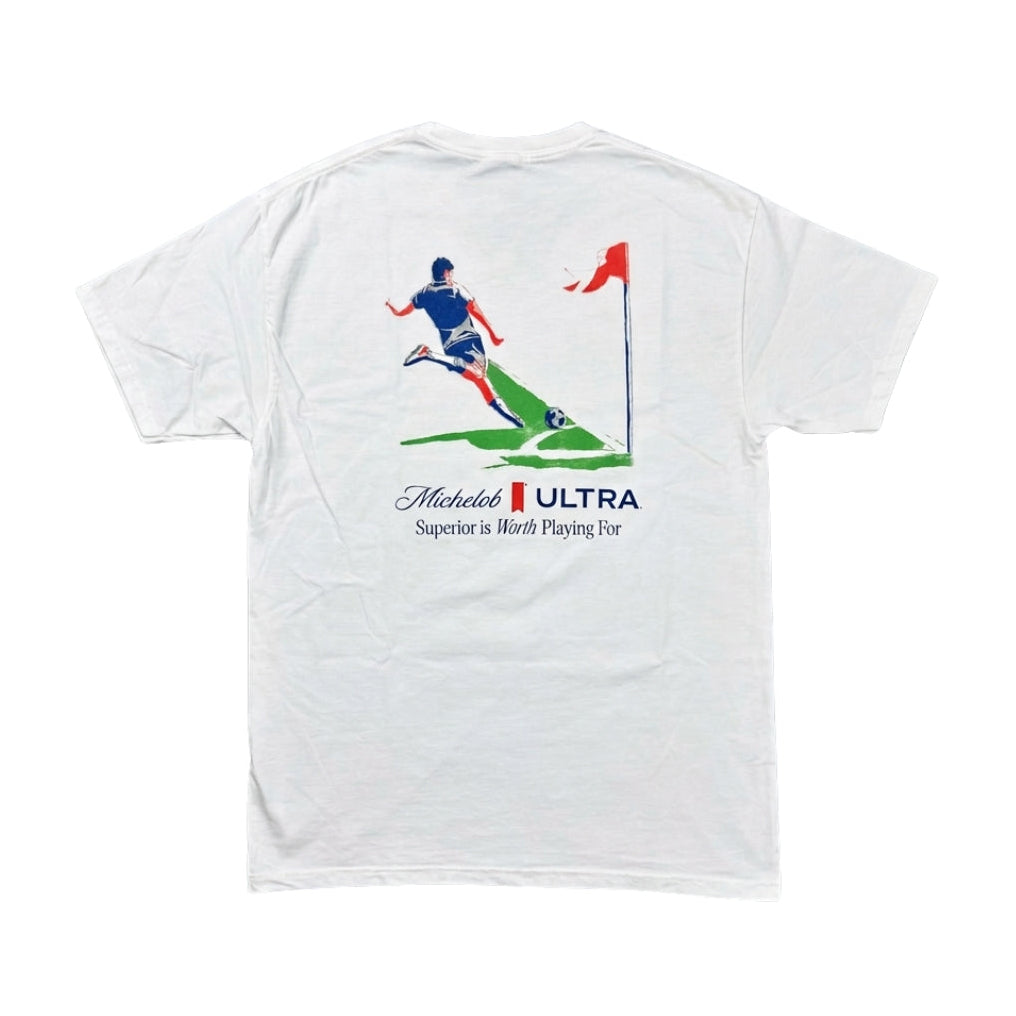 White t-shirt with a graphic of a soccer kicking a corner kick, featuring Michelob Ultra branding.