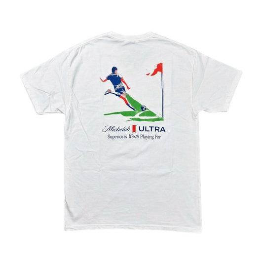 White t-shirt with a graphic of a soccer kicking a corner kick, featuring Michelob Ultra branding.