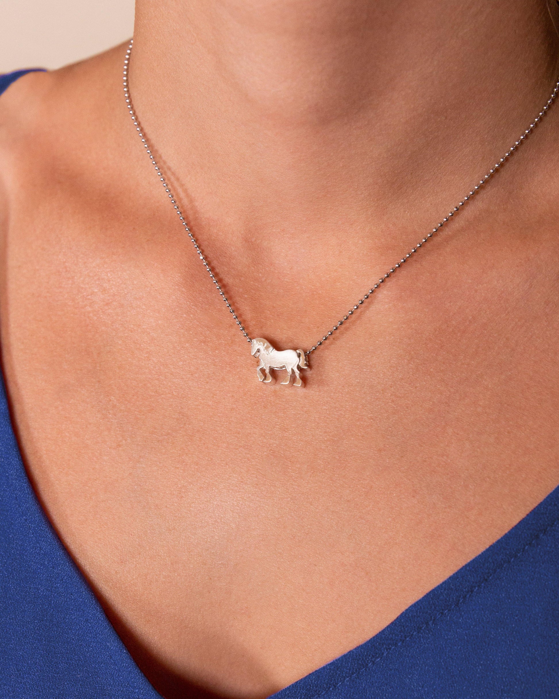 From Jewelry designer Alex Woo a 14 carat silver clydesdale necklace, 16 inches long