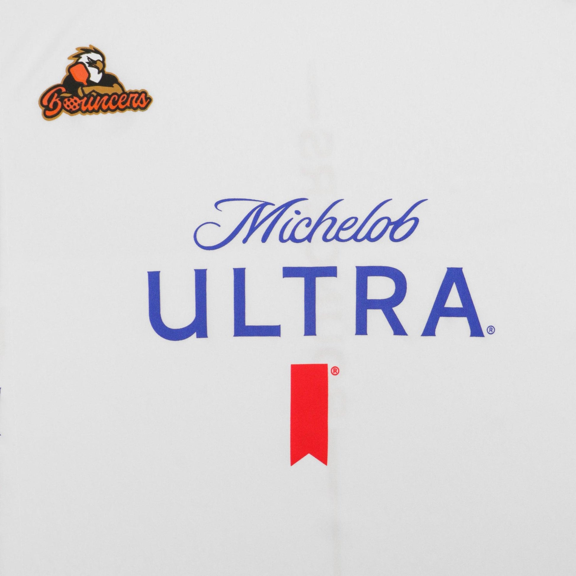 Close up of Michelob ULTRA logo on front of shirt