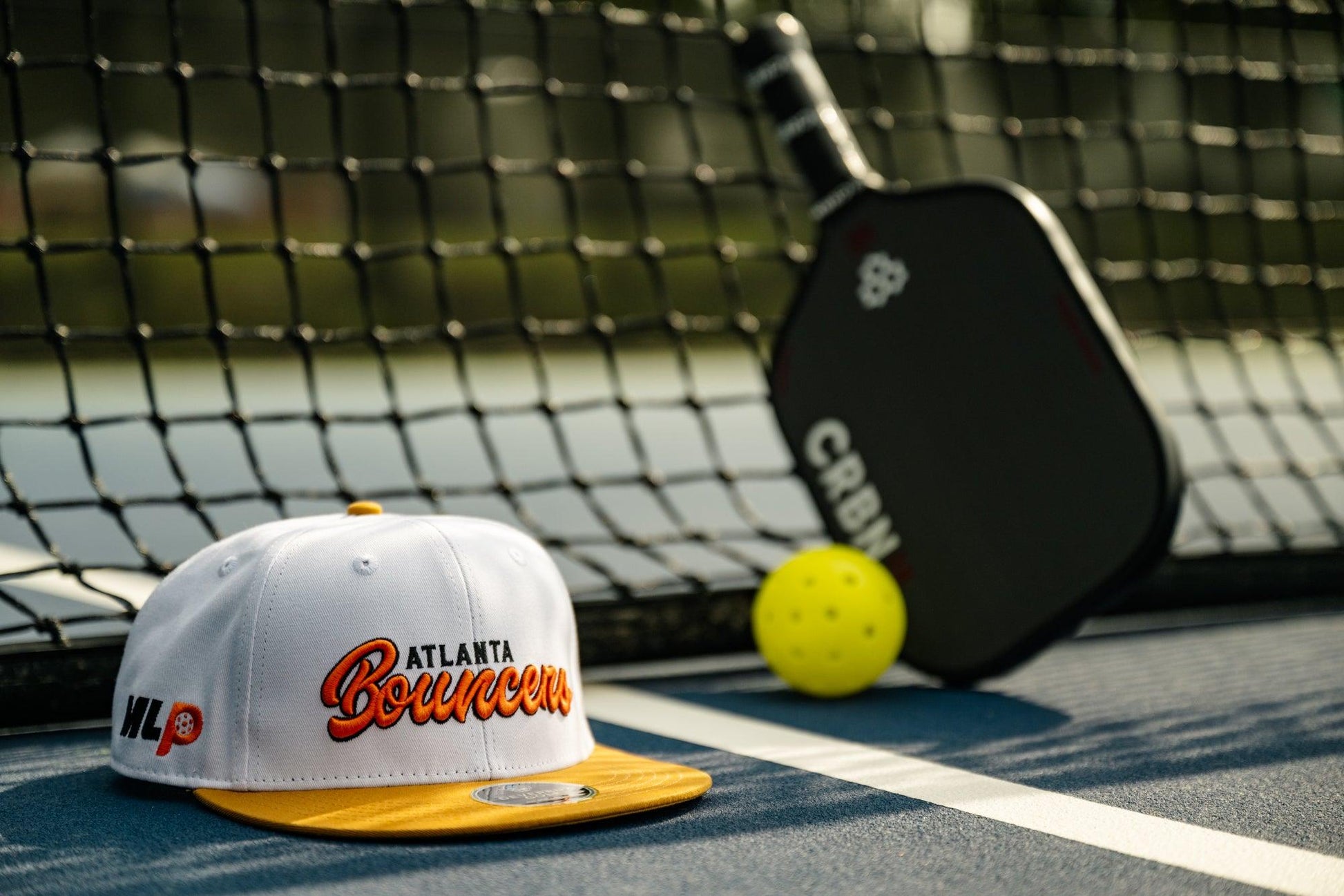 Atlanta Bouncers Devereux Hat Closeup Pickleball Court