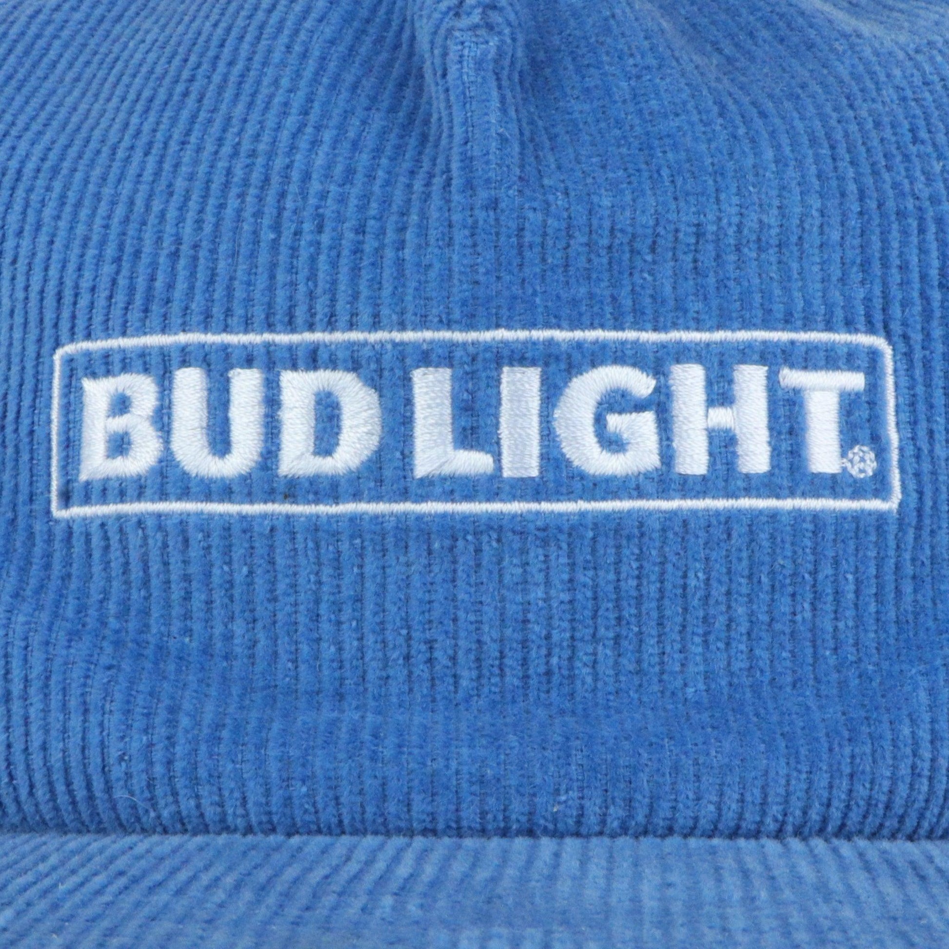 Close up of embroidered white Bud Light horizontal logo