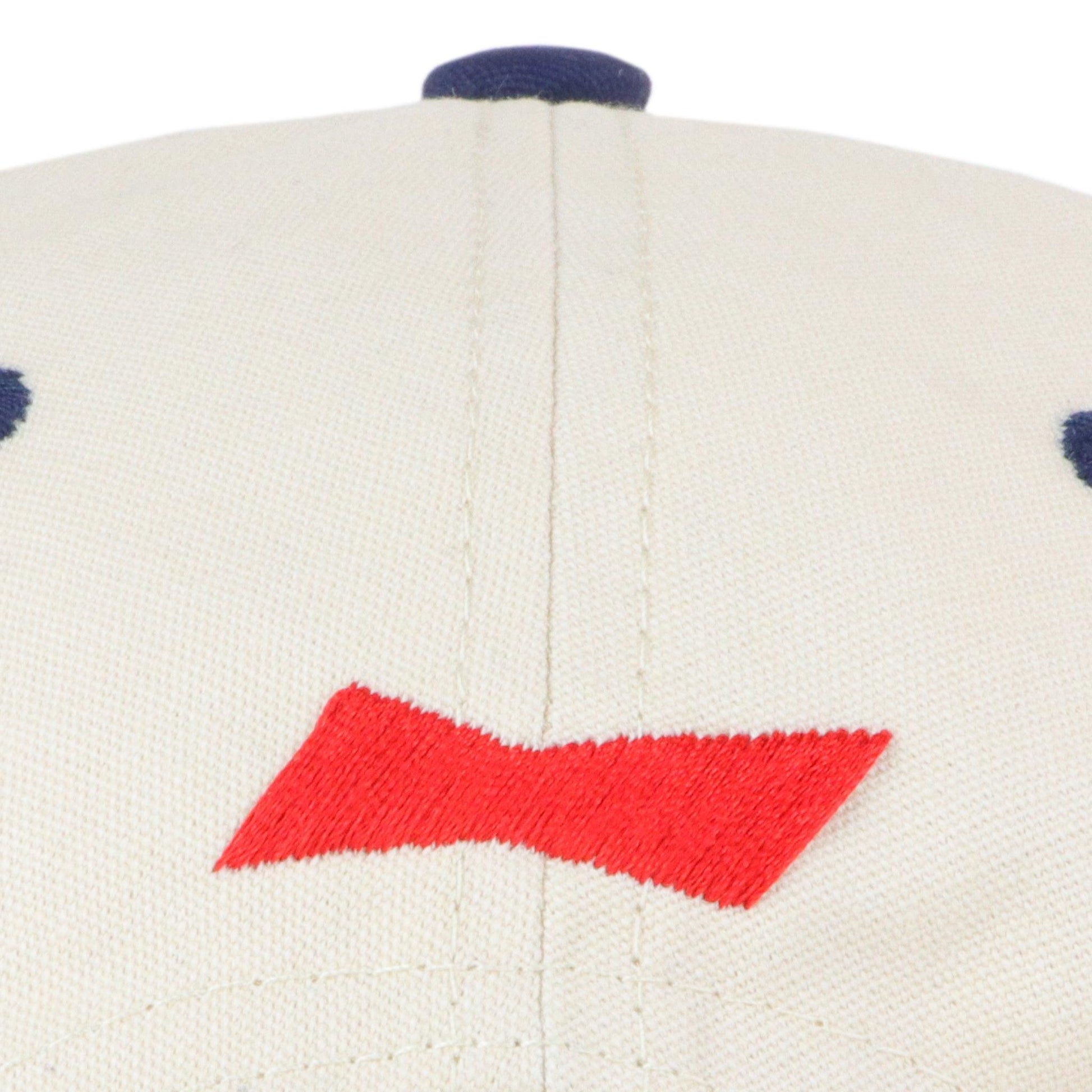 close up of blank Budweiser bowtie embroidered on back panel of hat