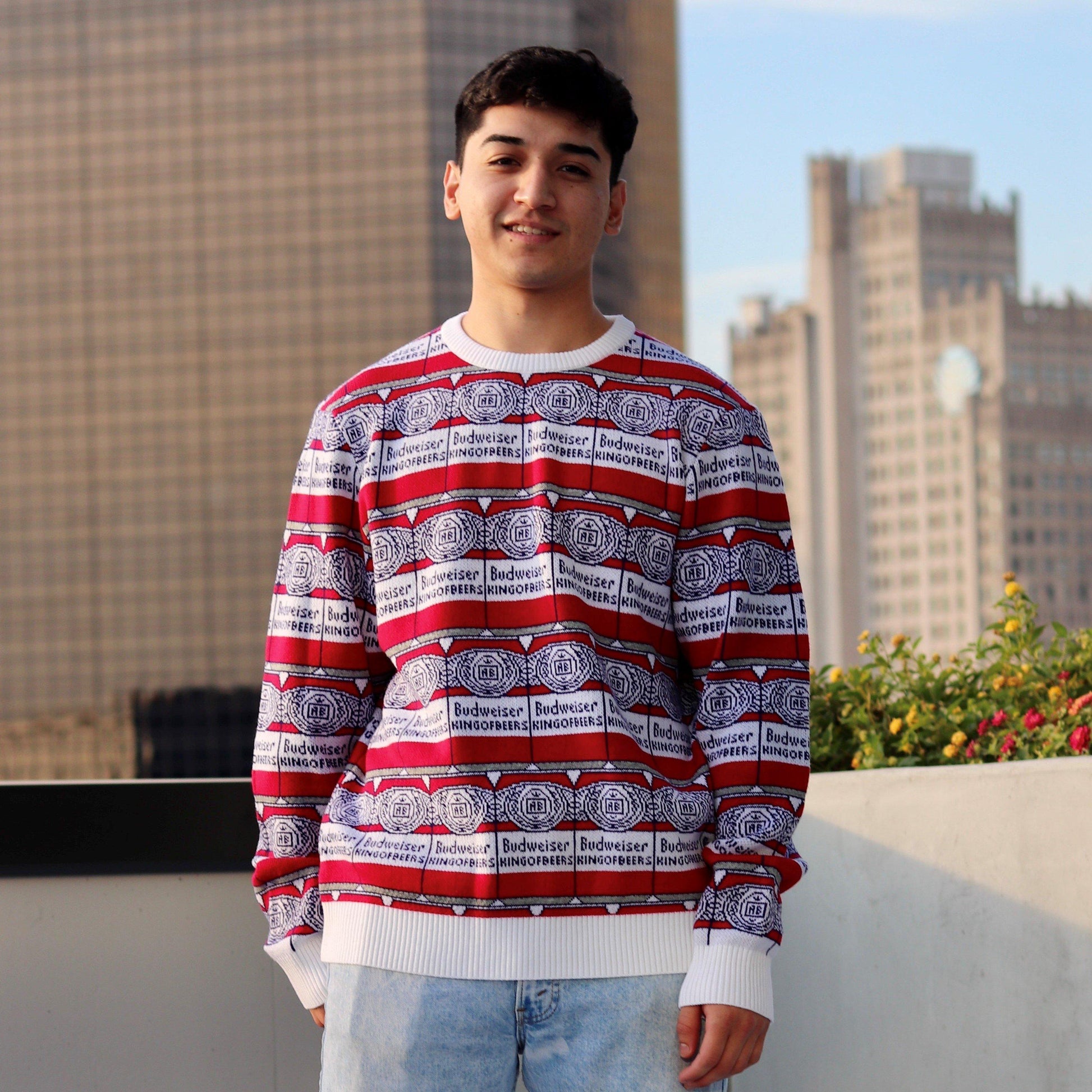 man wearing budweiser can repeat sweater