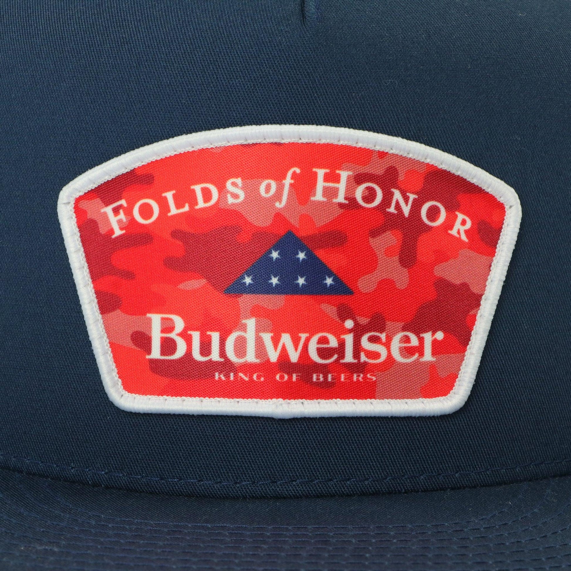 CLOSE UP OF BUDWEISER FOH PATCH ON FRONT OF HAT