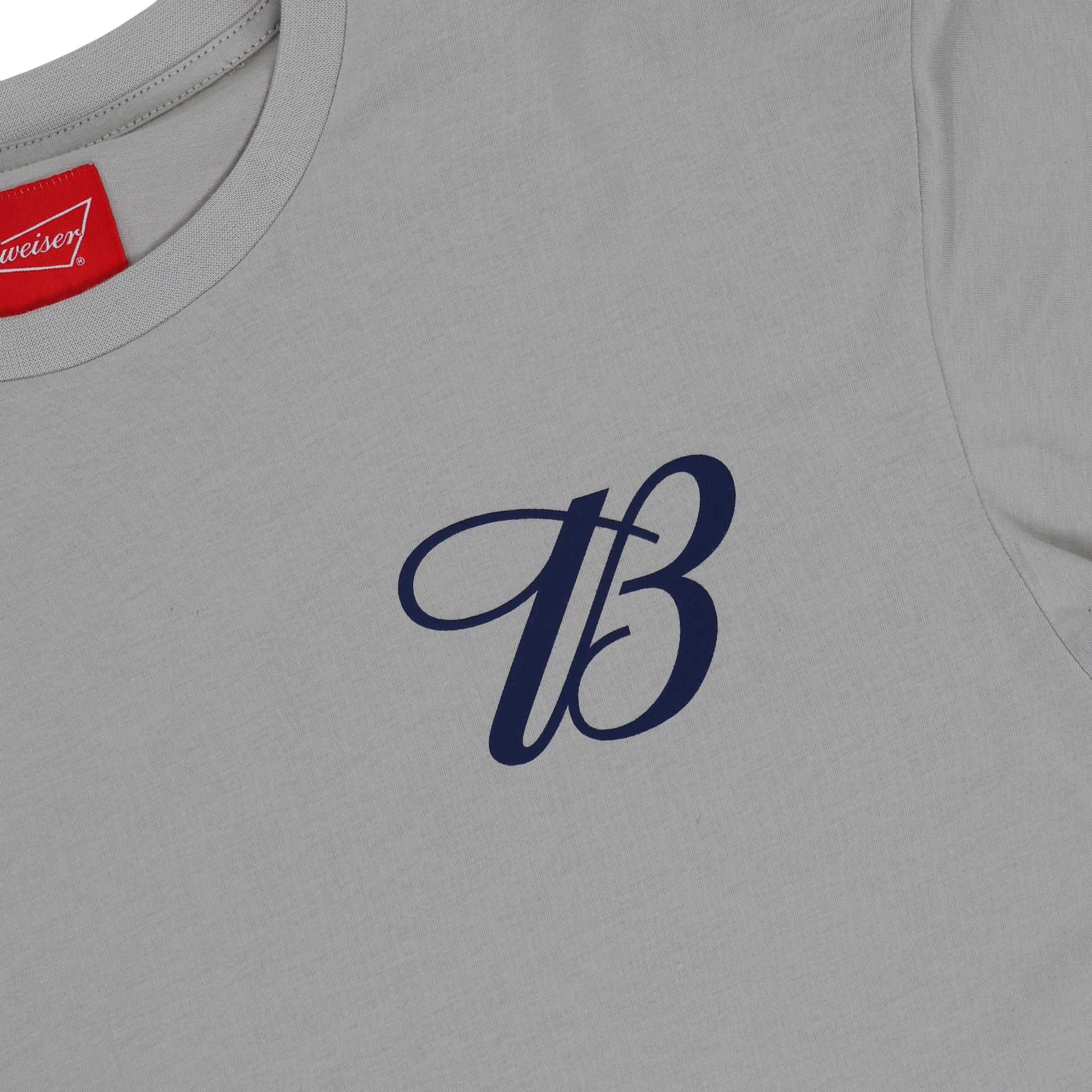 zoomed in picture of front left chest "B" logo