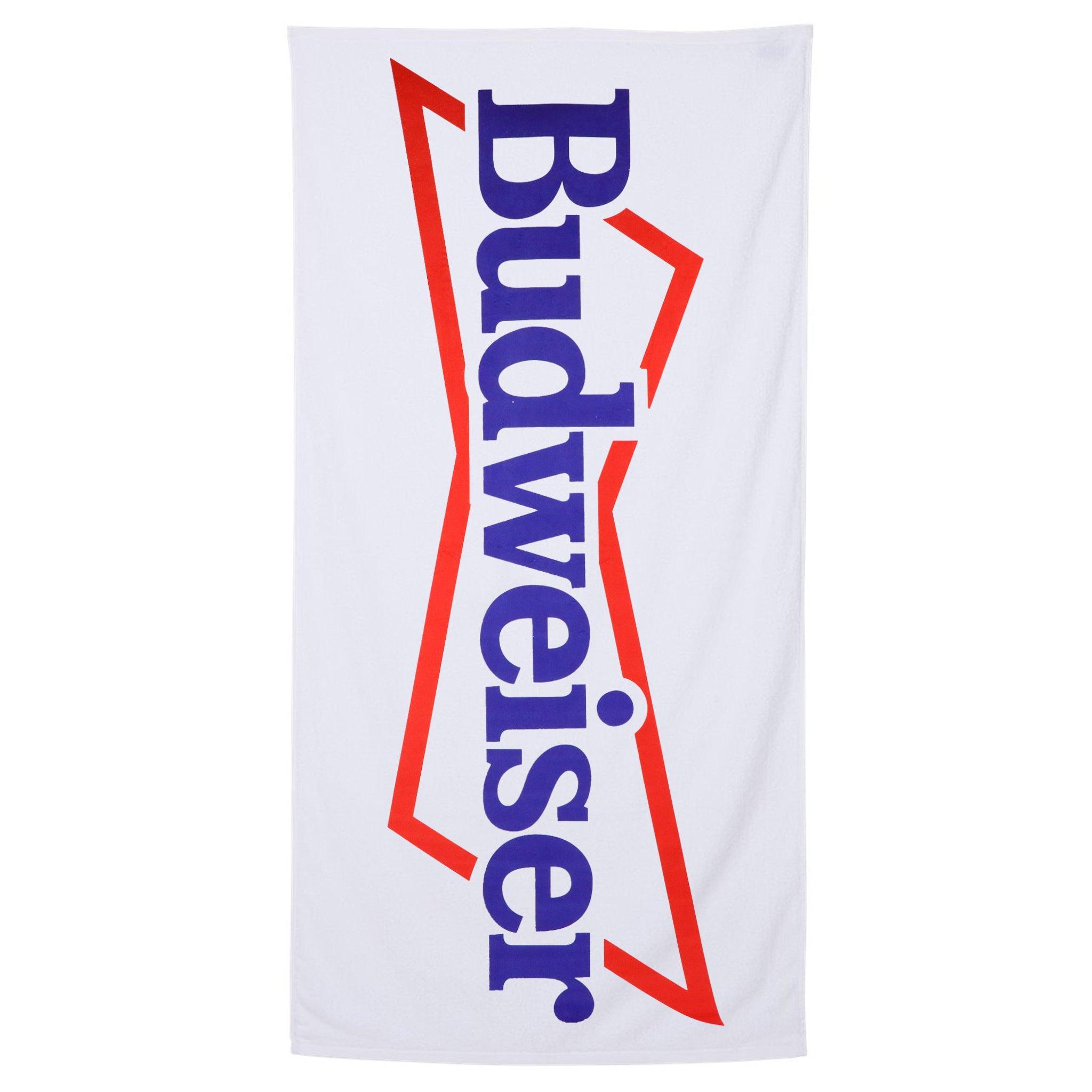 White beach towel with Budweiser logo with Bowtie outline around it. Budweiser logo goes the entire length of towel