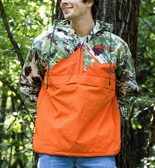 man wearing busch camo softshell jacket with the bottom half in the color orange