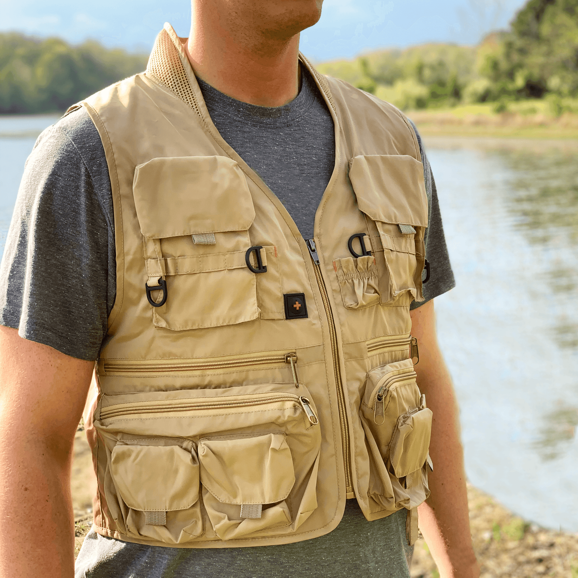 Man from the front wearing the Busch Light Fishing Vest by Lake