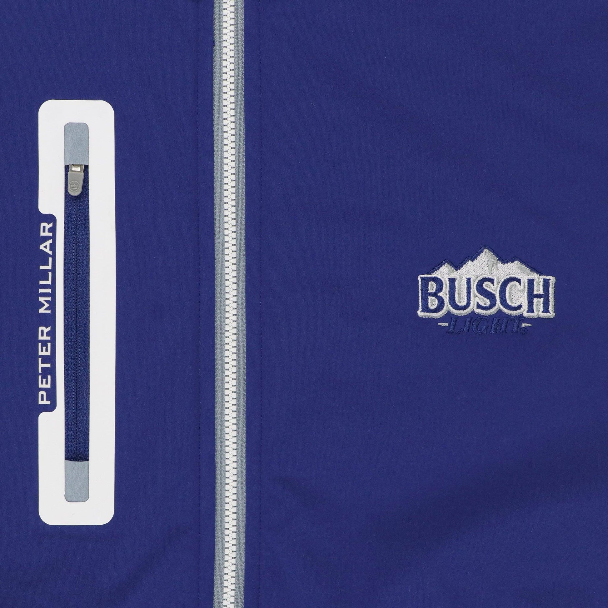 Close up of Embroidered Busch Light logo and front right chest pocket that reads peter Millar