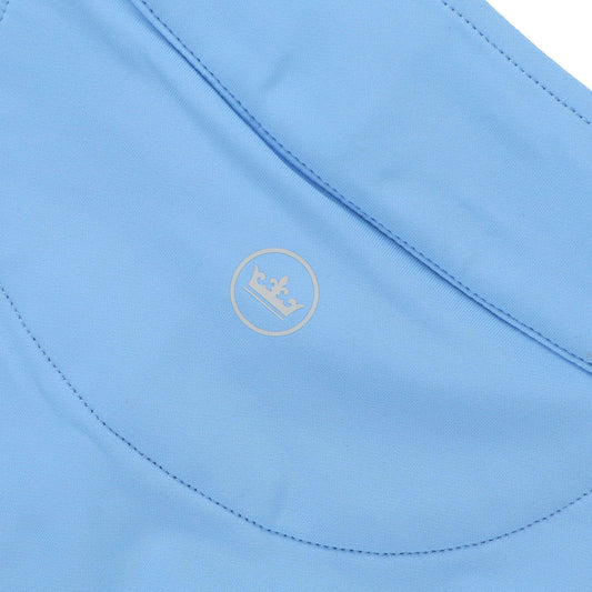 Close up of the Peter Millar crown logo on the back of the 1/4 zip by the neck.