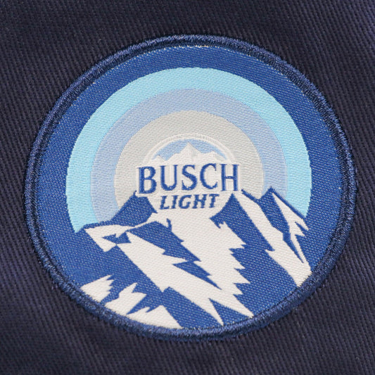 Close up of Busch Light patch with mountains