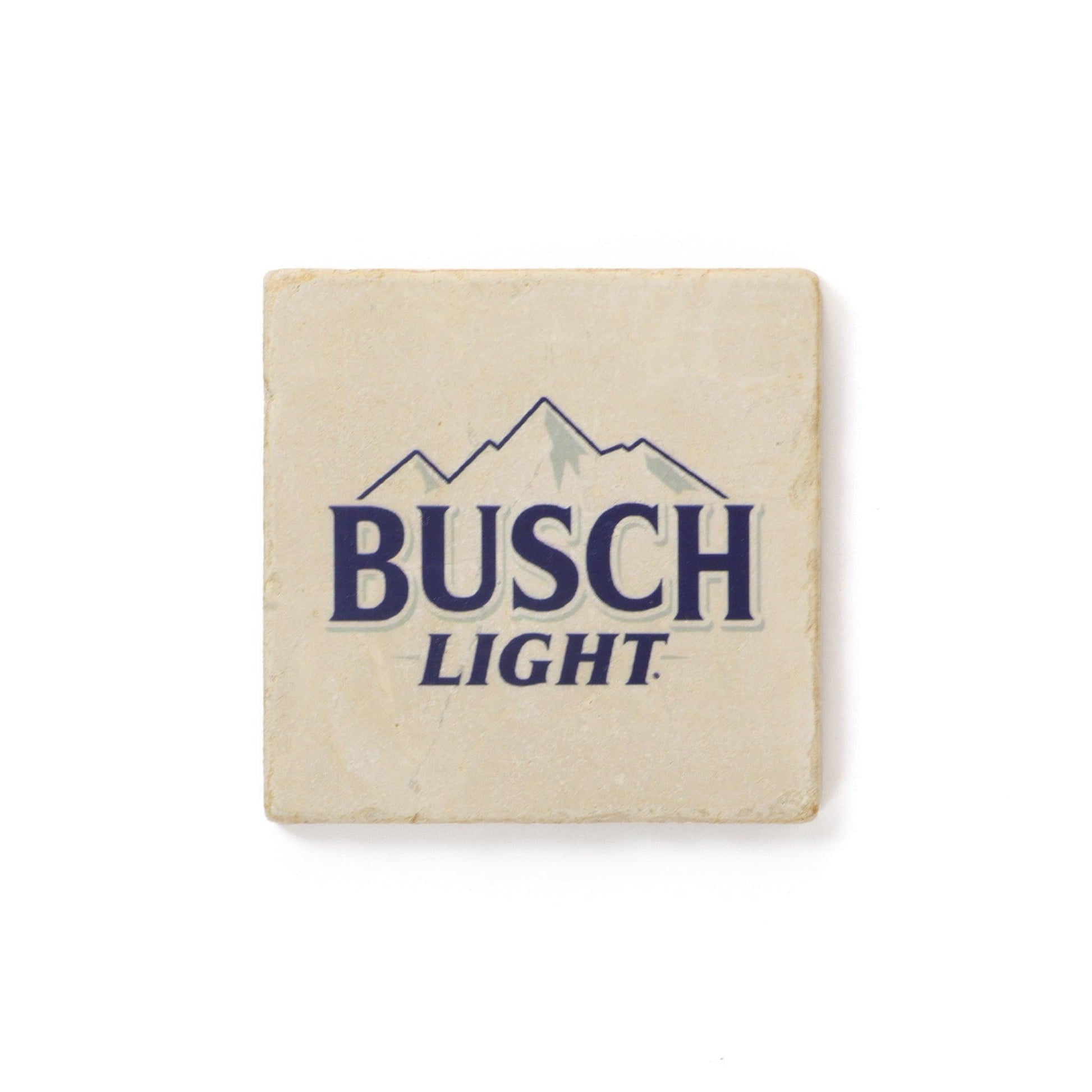 cream colored square stone coaster with Busch Light logo with mountains