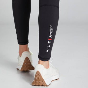 back left leg of leggings features Michelob ULTRA logo