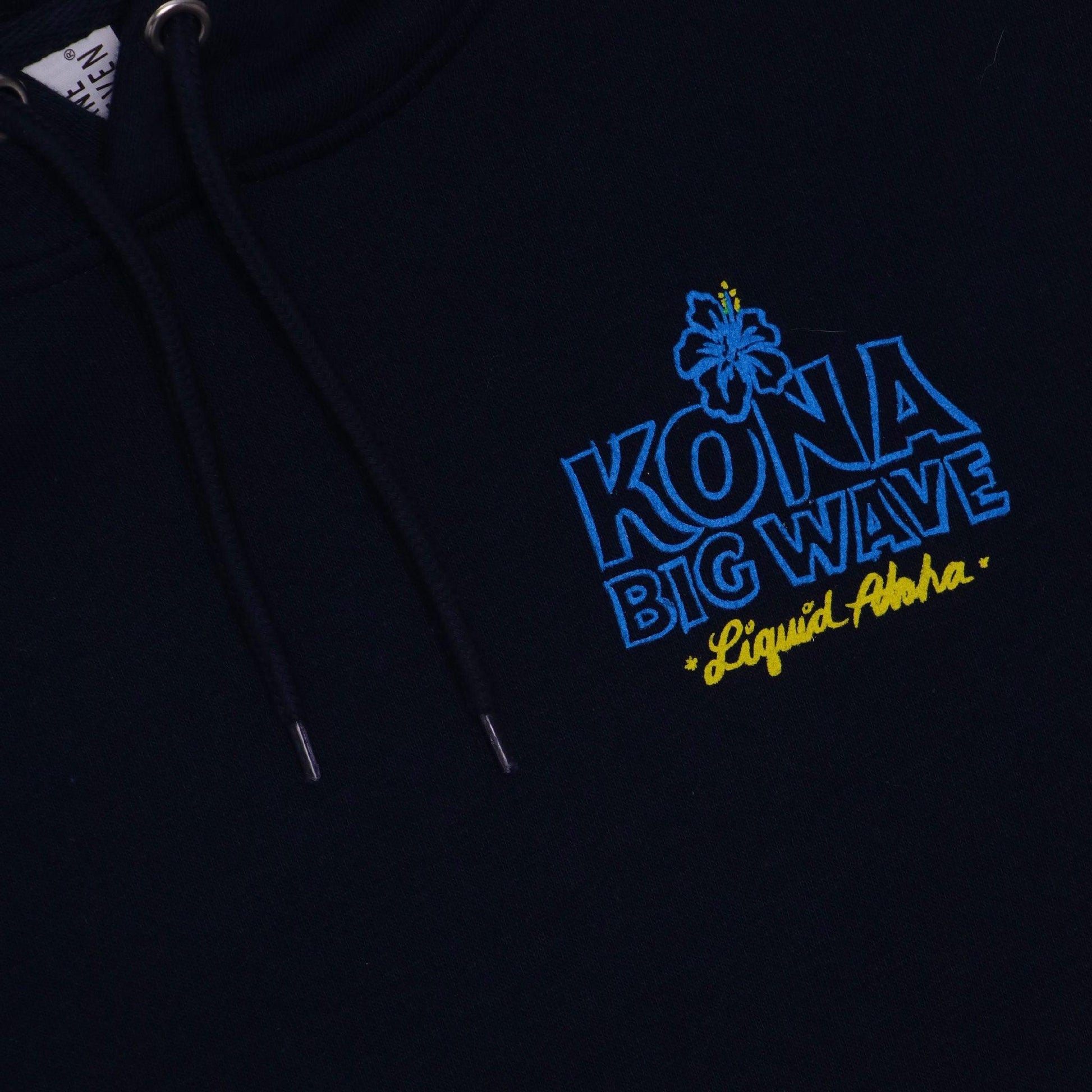 close up of Kona Big Wave logo on front left chest