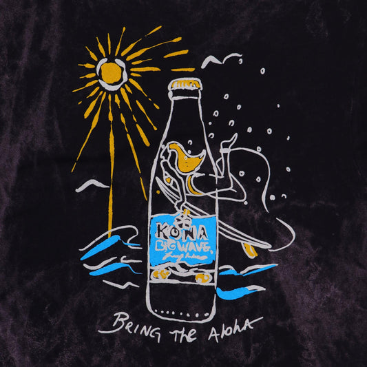 close up of the back print logo. bottle of kona big wave