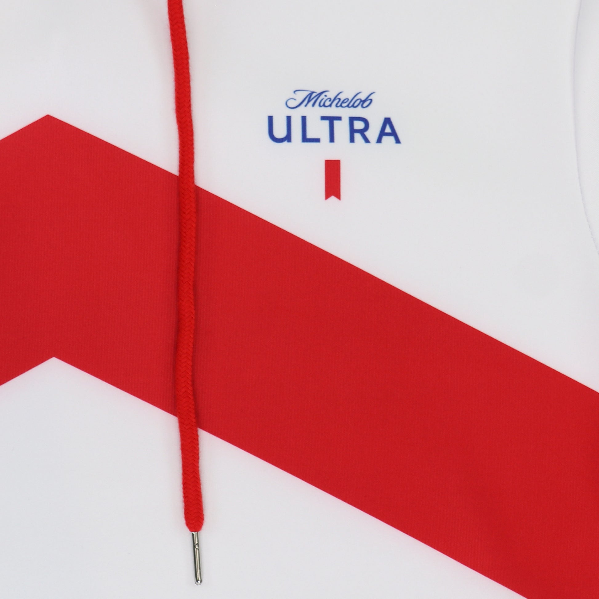 zoom in on white michelob ultra performance hoodie logo