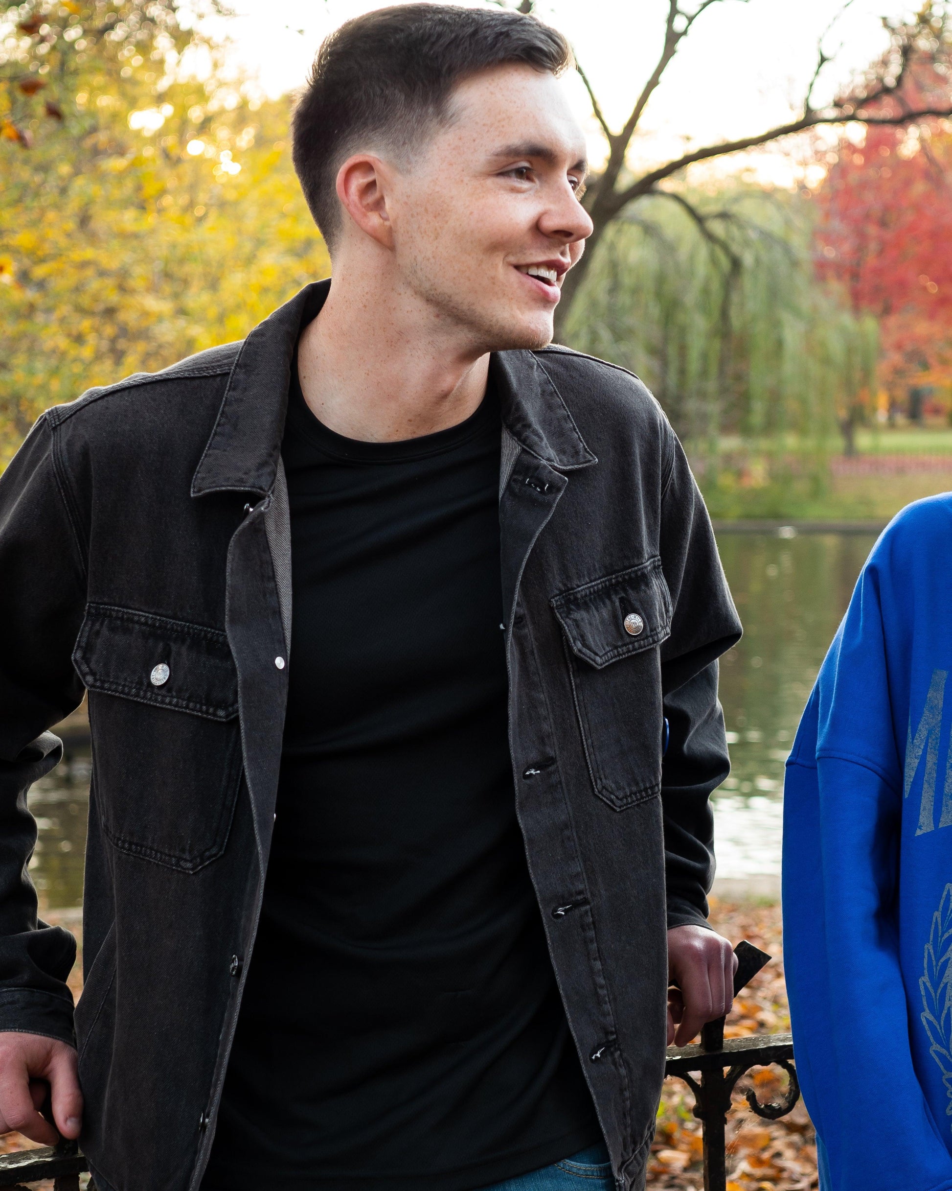 model wearing jean jacket unbuttoned 