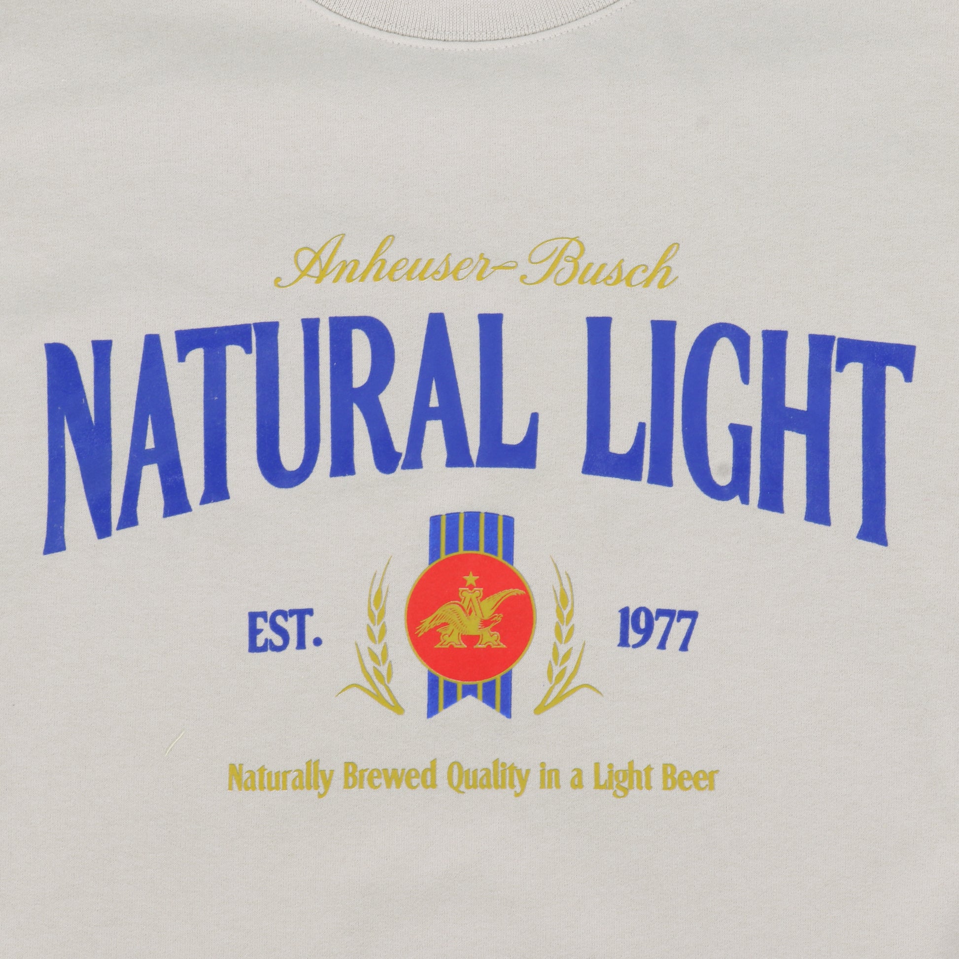 Close up of Natural Light Vintage Crewneck Logo