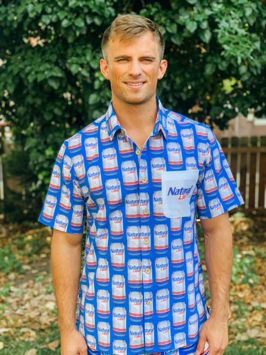 man wearing natural light scatter can camp shirt