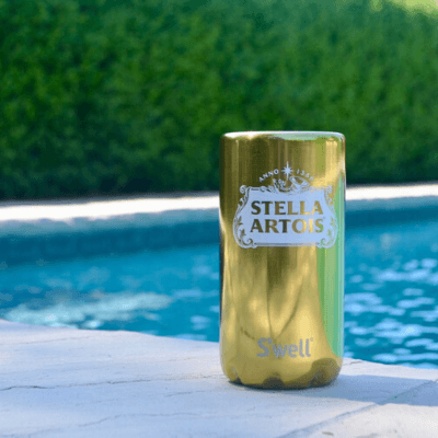 gold stella artois s'well chiller poolside