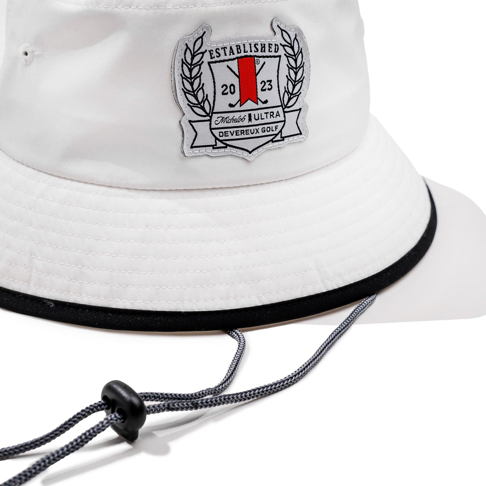 close up of white bucket hat with adjustable string