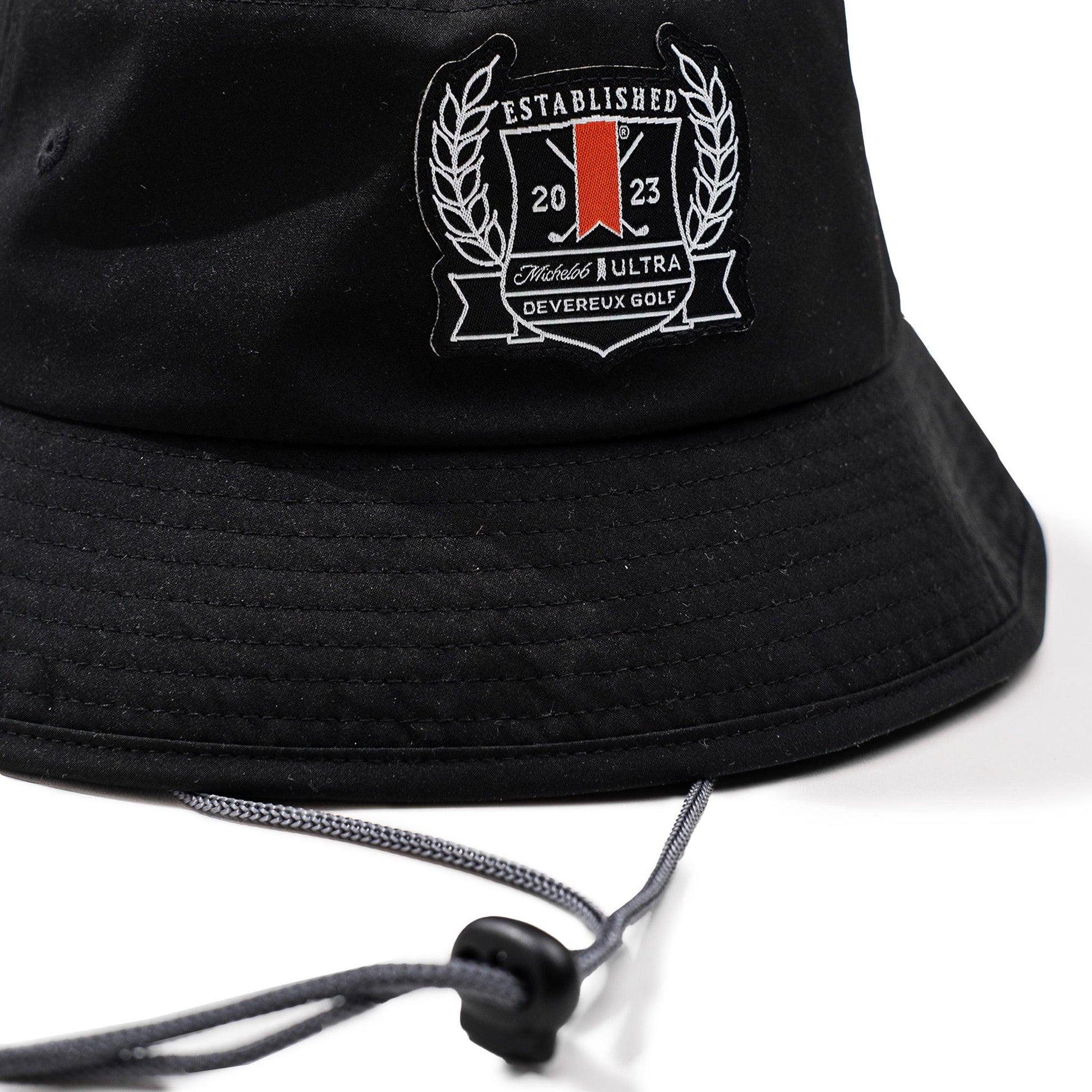 close up of black bucket hat with adjustable string